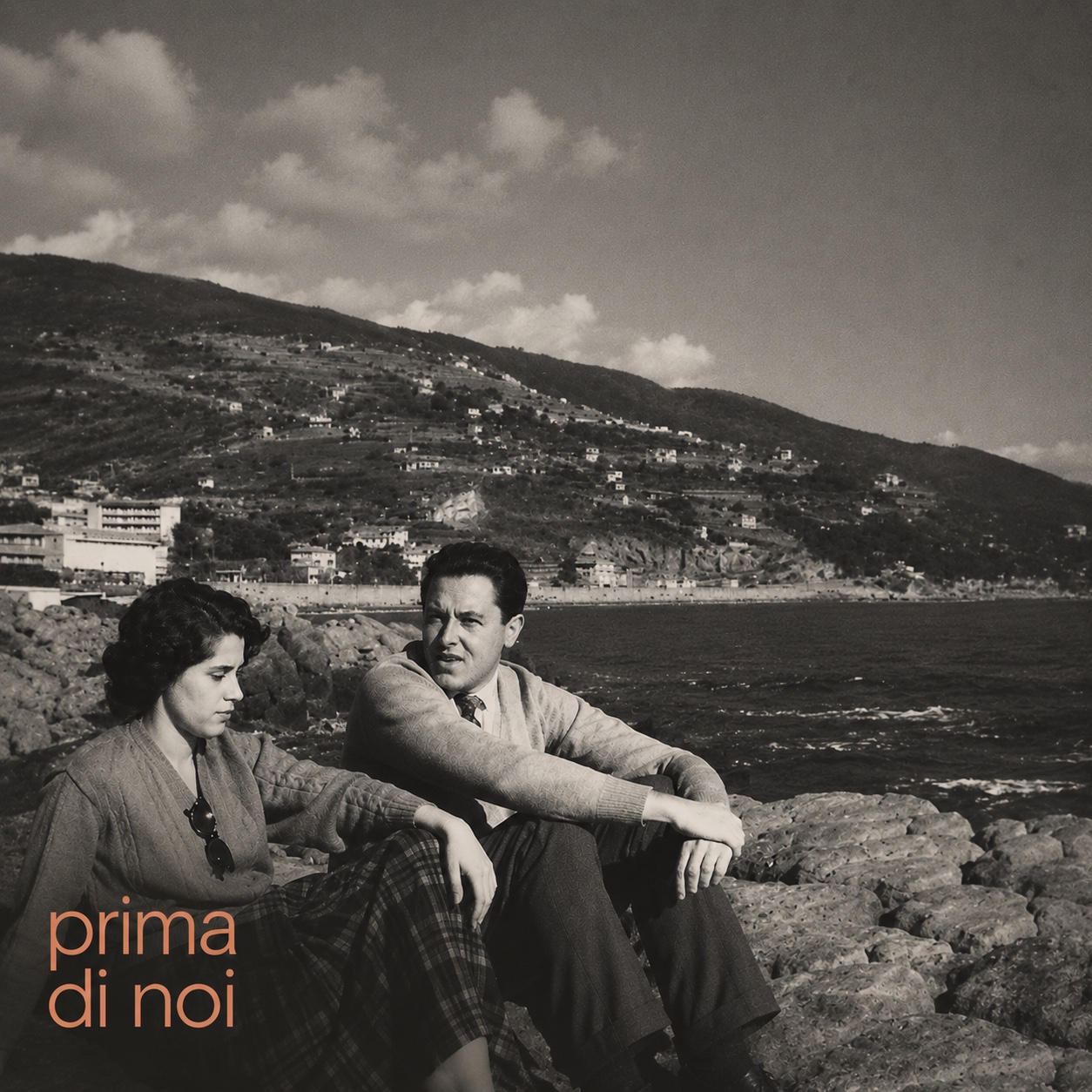 Prima di noi single artwork featuring Etta and Diego beside the sea